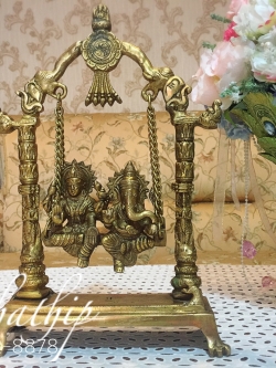 พระพิฆเนศและพระแม่ลักษมี ประทับนั่งชิงช้า (ทองเหลือง) ผลิตและนำเข้าจากอินเดีย - Ganesha: Lord of Success