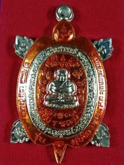 เหรียญพญาเต่าเรือนรุ่นแรก(2) รุ่นรวยสุขใจ หลวงปู่มหาศิลา วัดโพธิ์ศรีสะอาด กาฬสินธุ์ เนื้อทองทิพย์ ลงยาส้ม ปี 2564