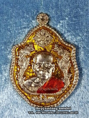 เหรียญมังกรคู่(1) รุ่นแรก มังกรโภคทรัพย์ หลวงพ่อพัฒน์ วัดห้วยด้วน เนื้ออัลปาก้า ลงยา เหลือง จีวรส้ม ปี 2561